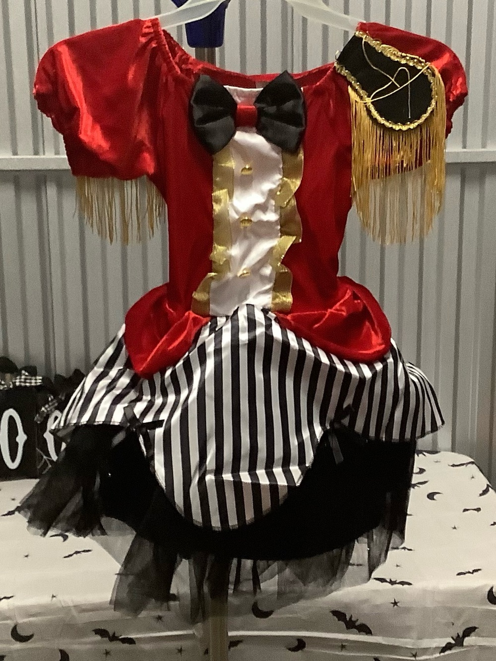 Red Ringmaster Kids Costume with Gold Accents and Black Bow size medium